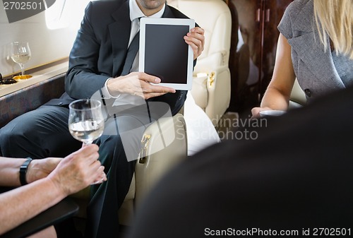 Image of Business Colleagues Meeting In Private Jet