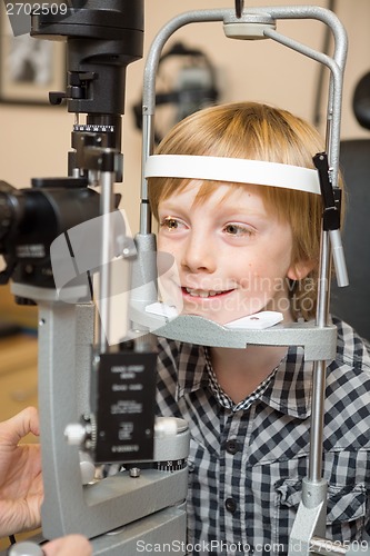Image of Boy Undergoing Eye Examination Test With Slit Lamp