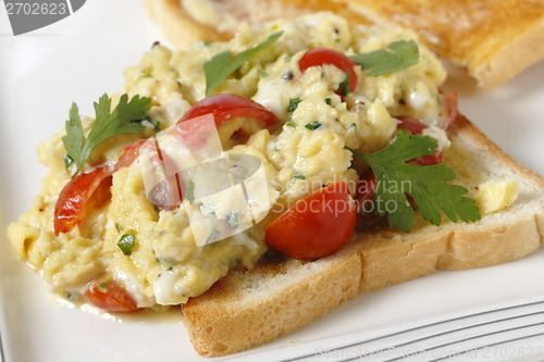 Image of Srambled egg and tomato closeup