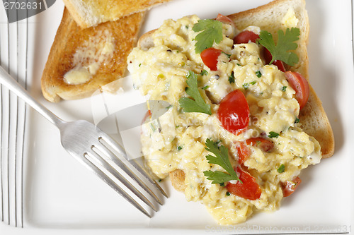 Image of Scrambled egg and tomatoes from above