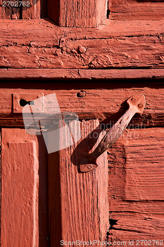 Image of spain knocker  door wood in the red brown 