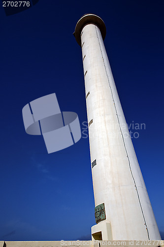 Image of lighthouse and window in the blue sky   e teguise 