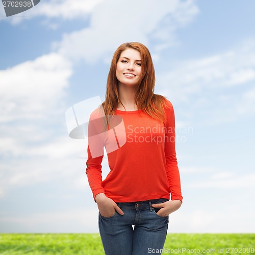 Image of smiling teen girl outdoors