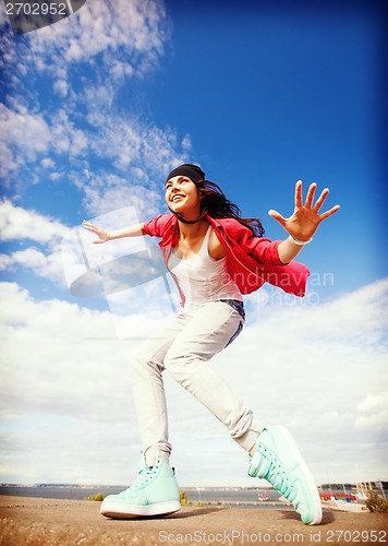 Image of beautiful dancing girl in movement