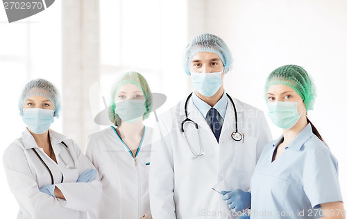 Image of group of doctors in operating room