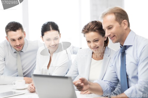 Image of business team having discussion in office