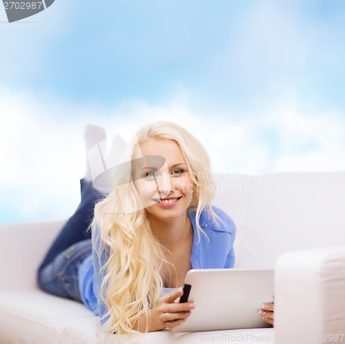 Image of smiling woman with tablet pc computer