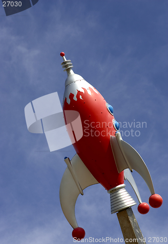 Image of Rocket against blue sky