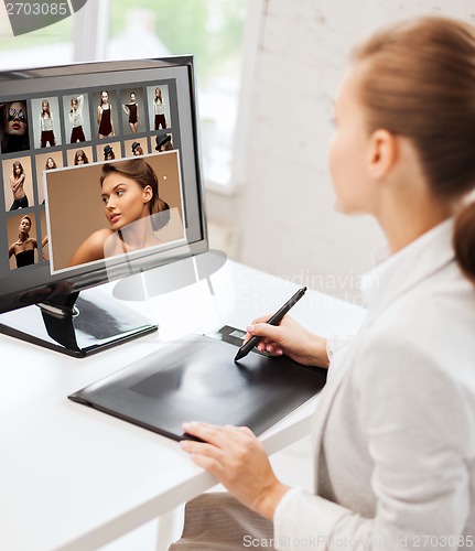 Image of female retoucher working at home or office