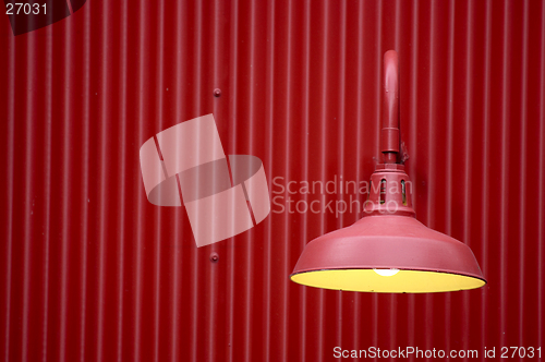 Image of Red light against red metal background