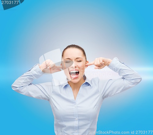 Image of angry screaming businesswoman