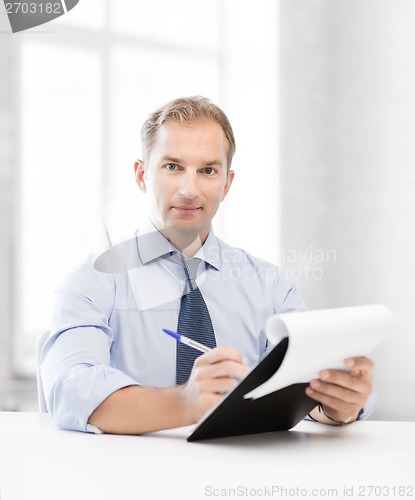 Image of businessman taking employment inteview