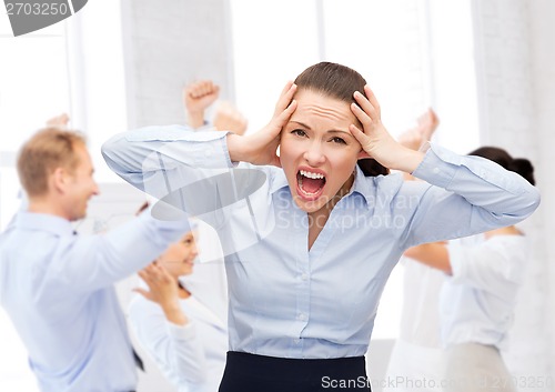 Image of angry screaming businesswoman