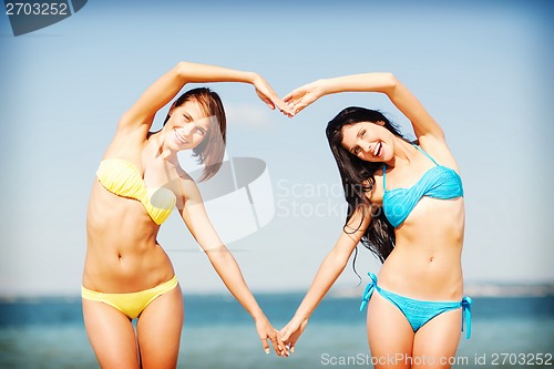 Image of girls having fun on the beach