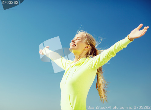 Image of woman doing sports outdoors