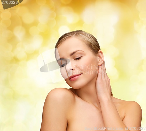 Image of face and hands of beautiful woman