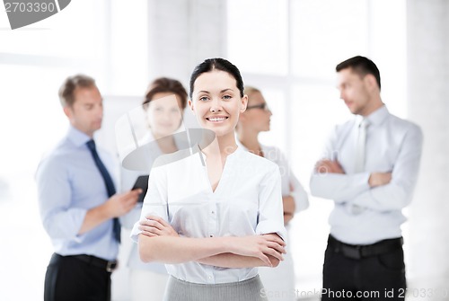 Image of businesswoman in office