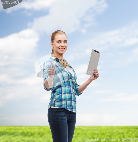 Image of smiling girl with tablet pc computer