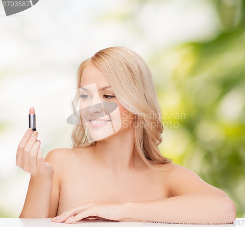 Image of beautiful woman with pink lipstick