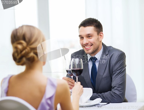 Image of young man looking at girlfriend or wife