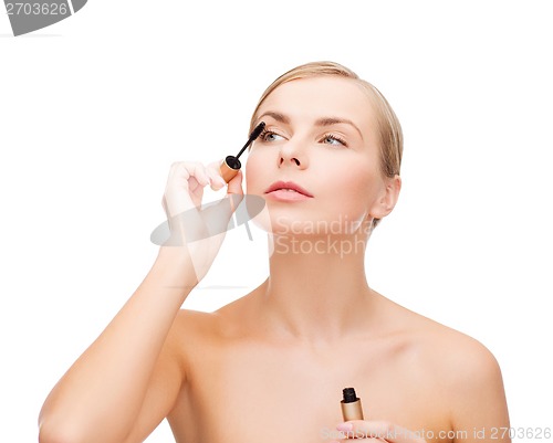 Image of beautiful woman with mascara