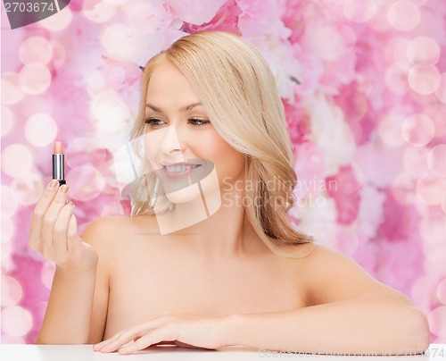 Image of beautiful woman with pink lipstick