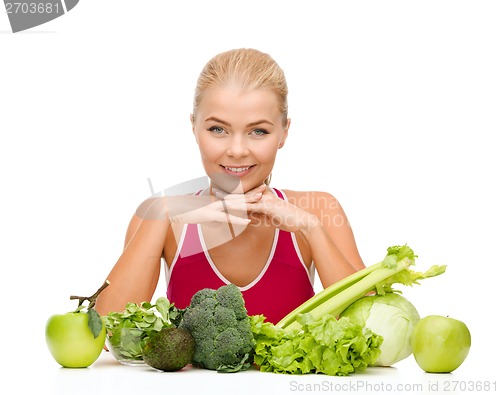 Image of smiling sporty woman with organic food