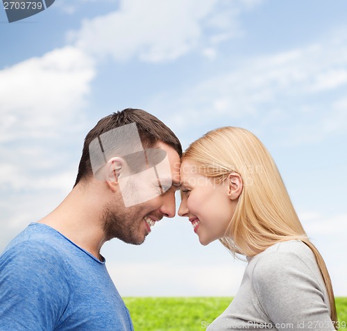 Image of smiling couple looking at each other