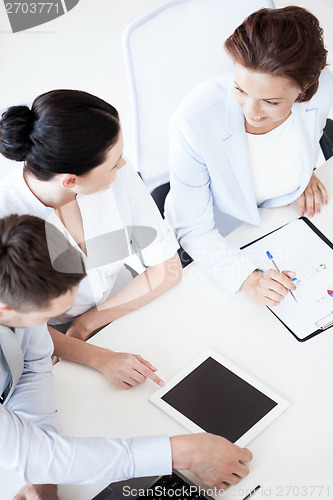 Image of business team having discussion in office