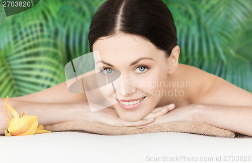 Image of smiling woman in spa salon