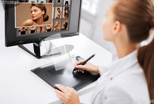 Image of female retoucher working at home or office
