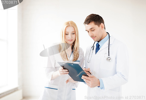 Image of two young attractive doctors