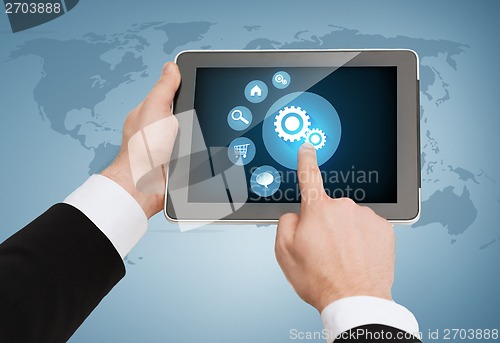 Image of close up of man hands touching tablet pc