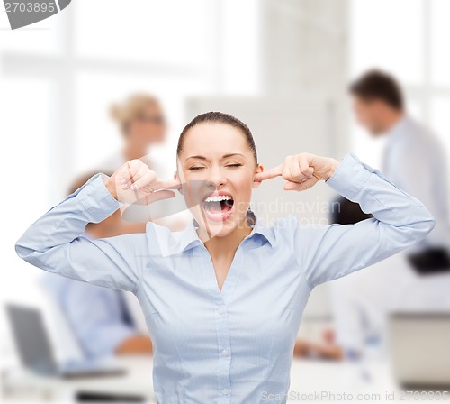 Image of angry screaming businesswoman