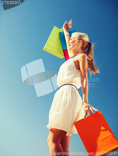 Image of woman with shopping bags