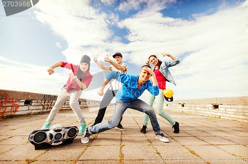 Image of group of teenagers dancing