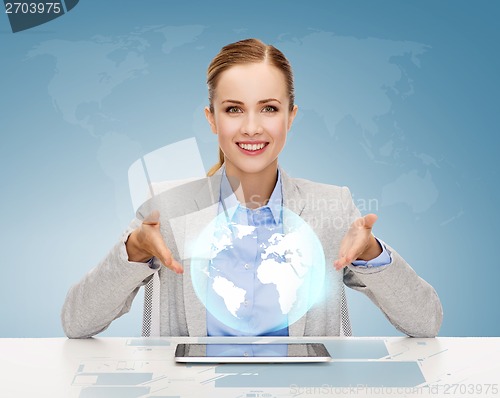 Image of smiling businesswoman with tablet pc