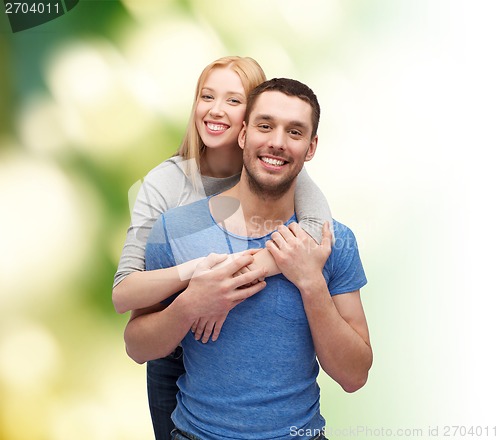 Image of smiling couple hugging