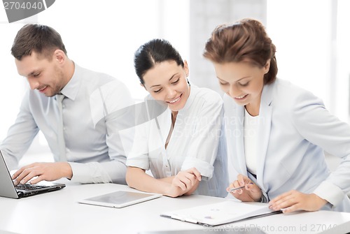 Image of business team working in office