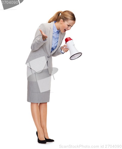 Image of angry businesswoman with megaphone