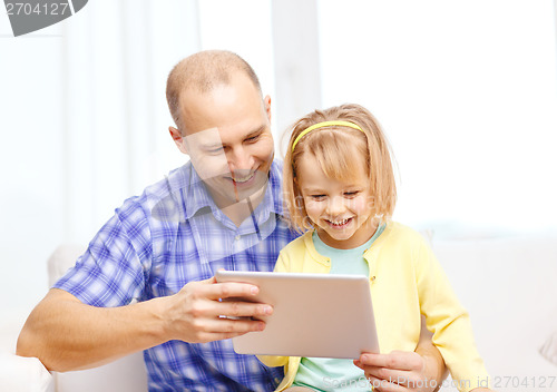 Image of happy father and daughter with tablet pc computer