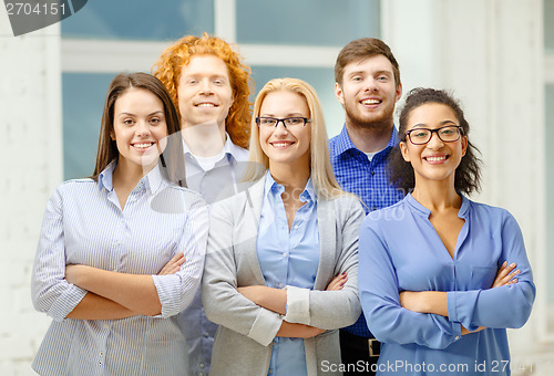 Image of happy creative team in office