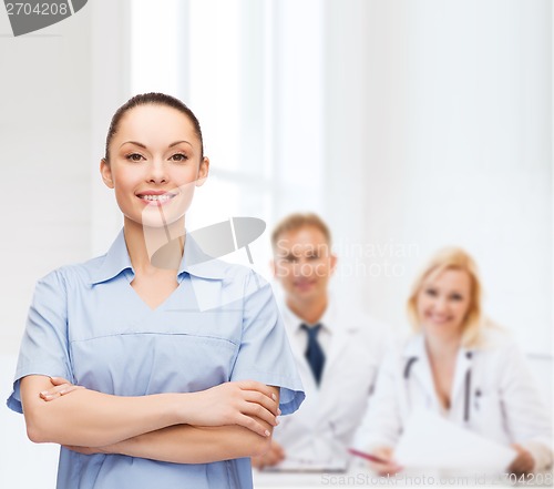 Image of smiling female doctor or nurse