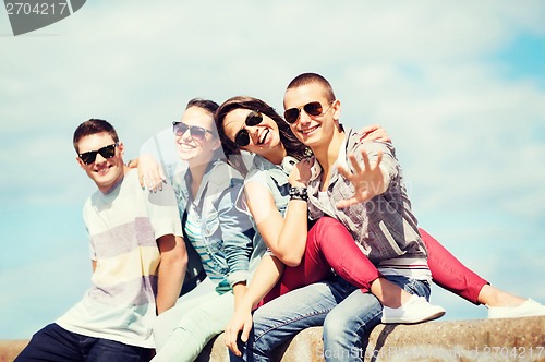 Image of group of teenagers hanging out