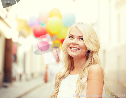 Image of couple with colorful balloons