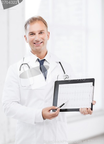 Image of male doctor with stethoscope showing cardiogram