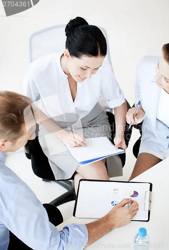 Image of business team having discussion in office