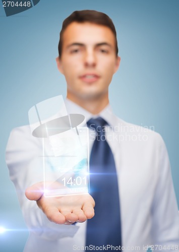 Image of buisnessman showing transparent phone