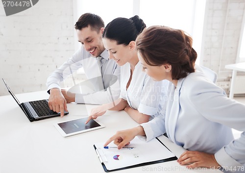 Image of business team working in office