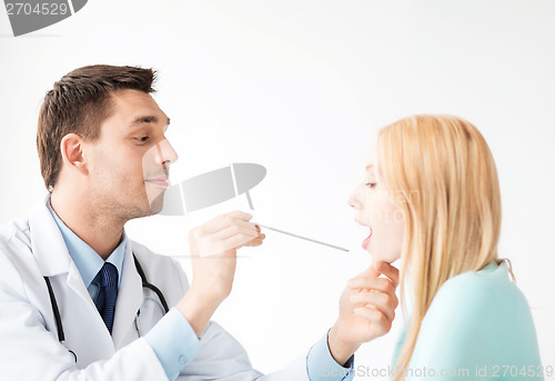 Image of male doctor with patient